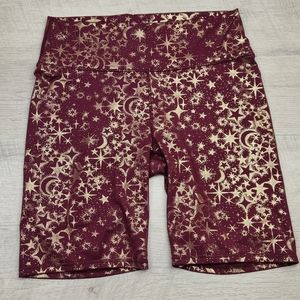 Fabletics Stars and Moon Biker Shorts Size L Burgundy Gold